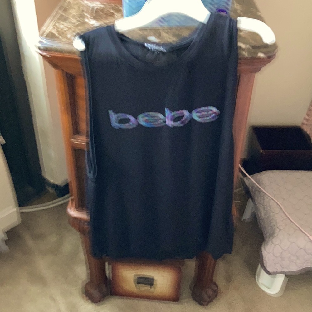 Sleeveless black top Size large. Never worn.